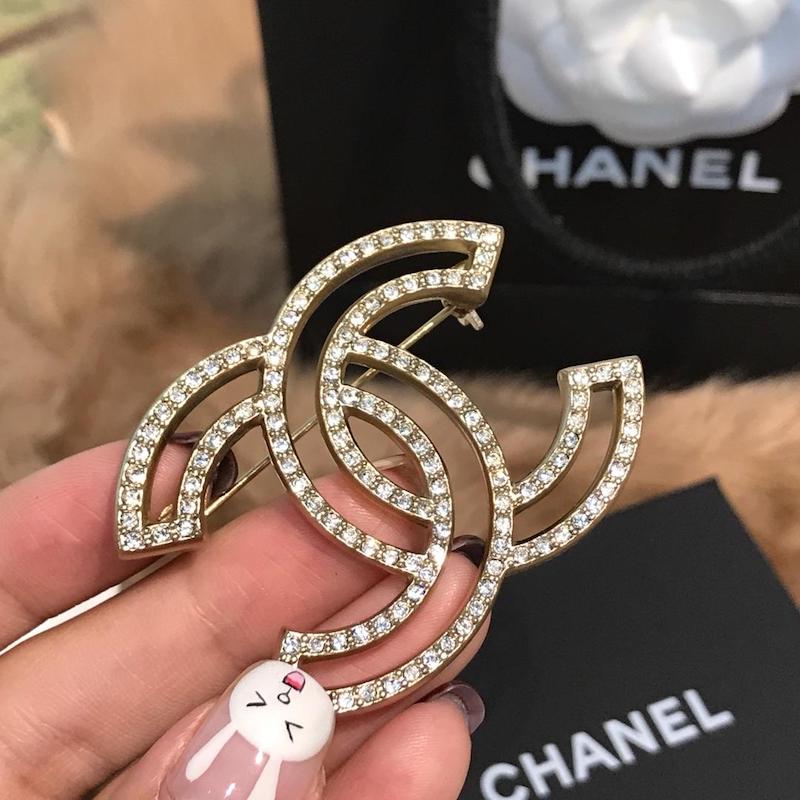 Chanel brooches